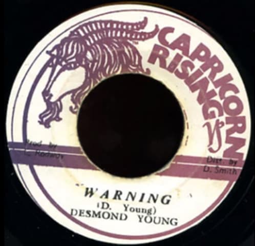 Desmond Young Backed By The Caribs (2) - Image 1